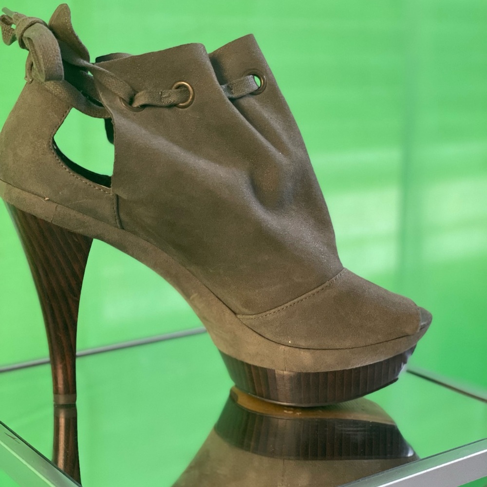 POWER. This suede statement bootie from NINE WEST is only for the bold. Size 8.5
